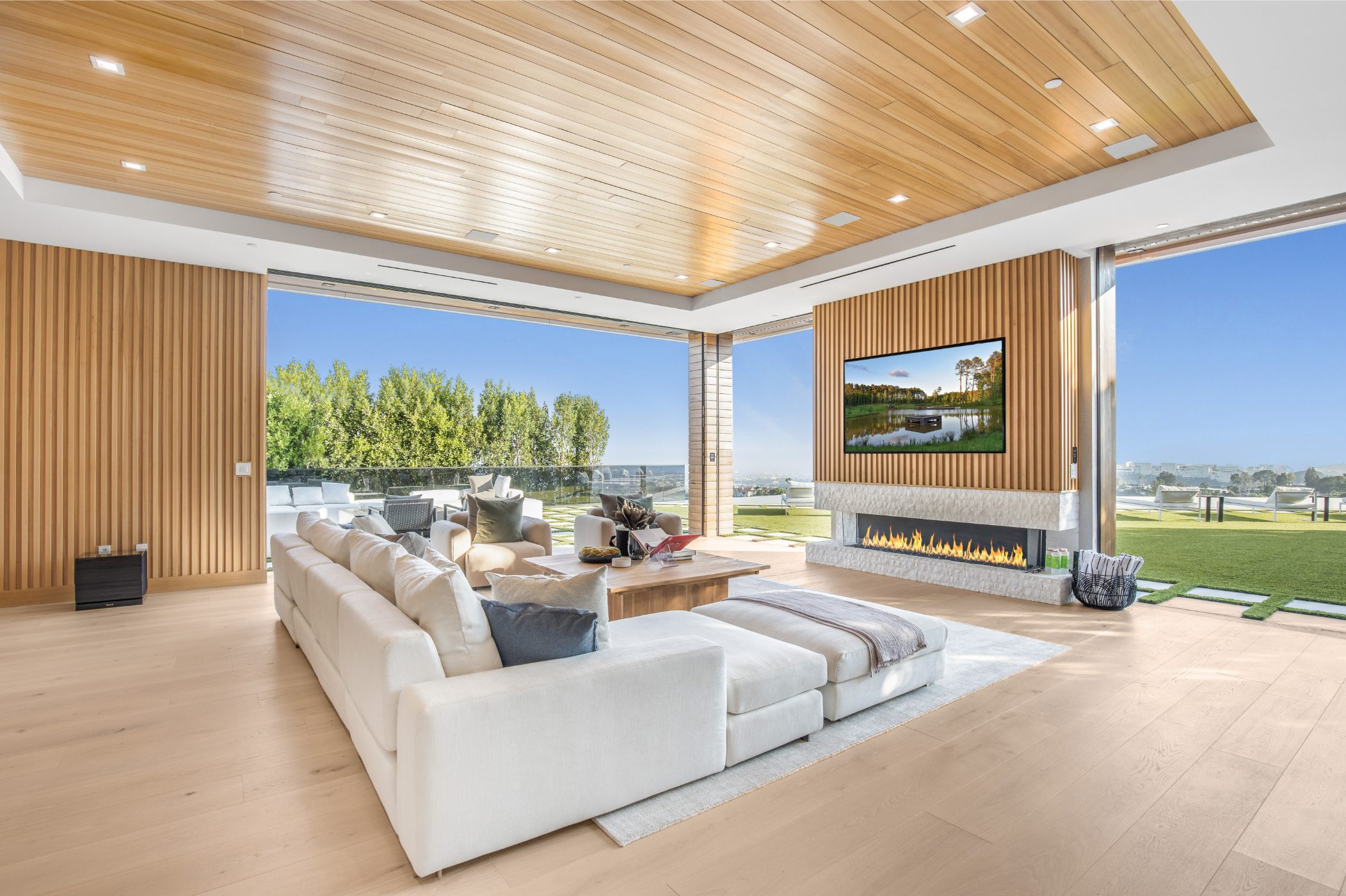 A bright, open living room with tall windows
